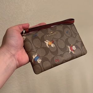 Coach Corner Zip Wristlet In Signature Canvas With Cat Mittens Print
